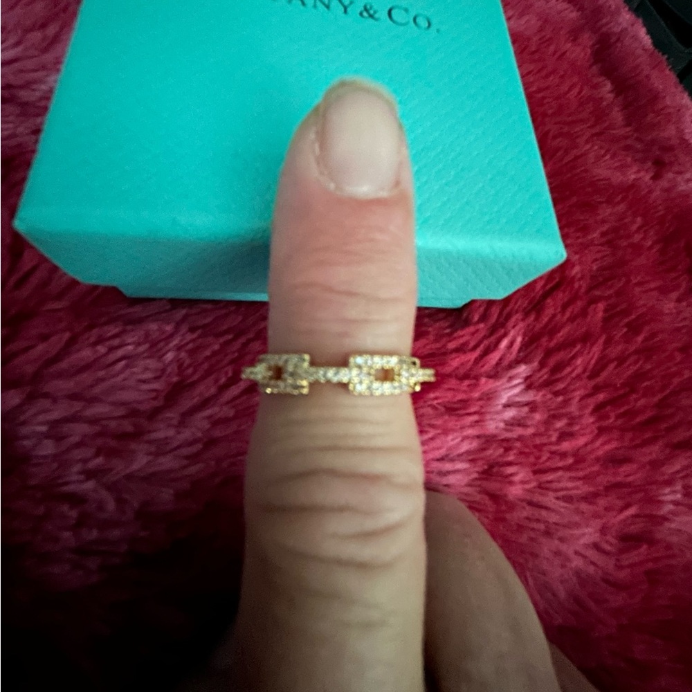 Gold with bling stones twist ring adjustable brand new